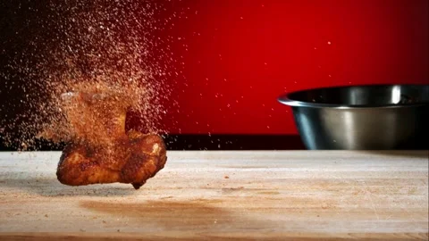 Fried chicken wing falling with spice rub Stock Footage 327178993