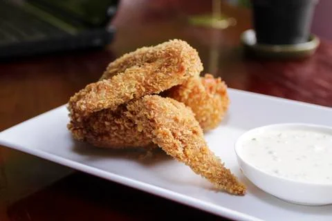 Fried chicken wing Stock Photos