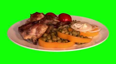 Fried chicken wings with raw vegetables on plate Stock Footage 47542734