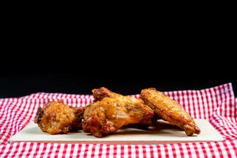 Fried chicken wings on table Stock Photos