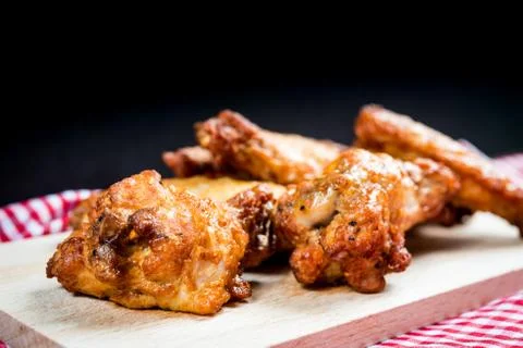 Fried chicken wings on table Stock Photos