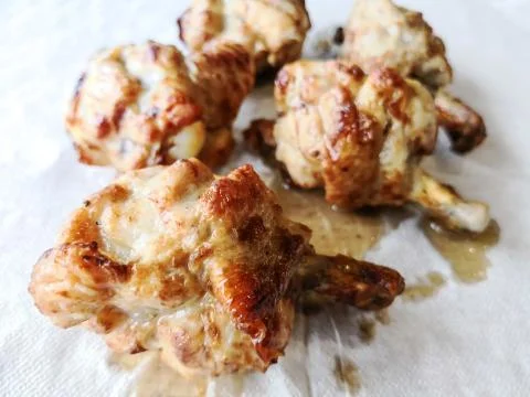 Fried chicken wings on table Stock Photos
