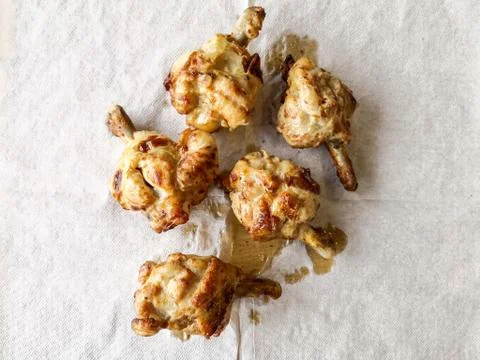 Fried chicken wings on table Stock Photos