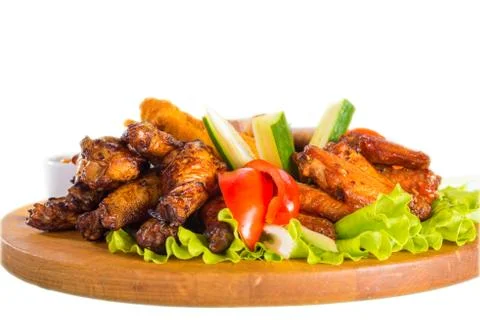 Fried chicken wings with vegetables Stock Photos