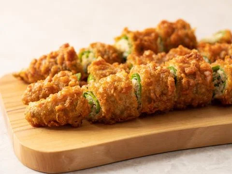 Fried chilli pepper stuffed minced meat and vegetables Stock Photos