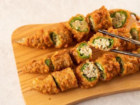 Fried chilli pepper stuffed minced meat and vegetables Stock Photos