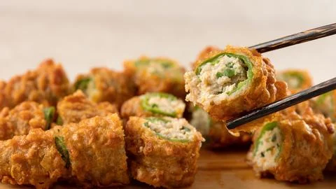 Fried chilli pepper stuffed minced meat and vegetables Stock Photos