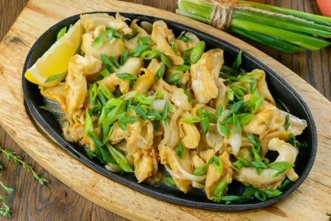 Fried clams with herbs Stock Photos