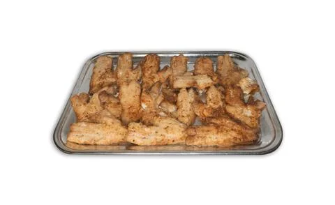 Fried cod on a metal tray. Isolated object on a white background. Stock Photos