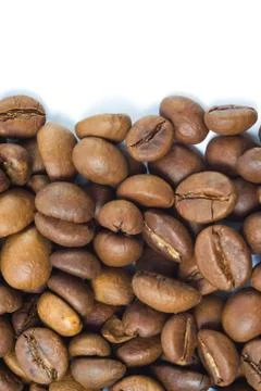 Fried coffee beans close-up. background. Copy space Stock Photos