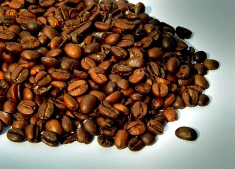 Fried coffee beans close-up Stock Photos