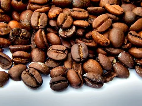 Fried coffee beans close-up Stock Photos