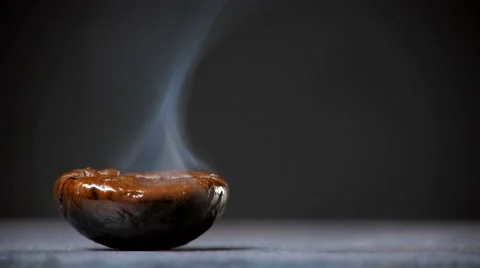 Fried coffee beans with smoke. Close up. Stock Footage 60996993
