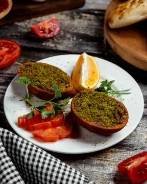 Fried cotletes with green on the table Stock Photos