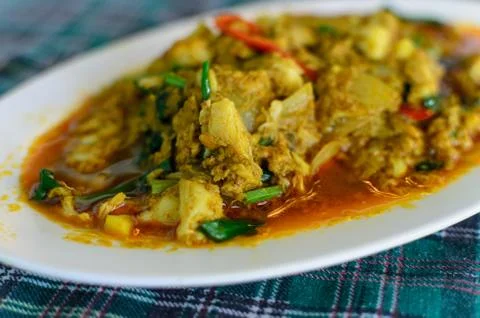 Fried crab with curry Stock Photos