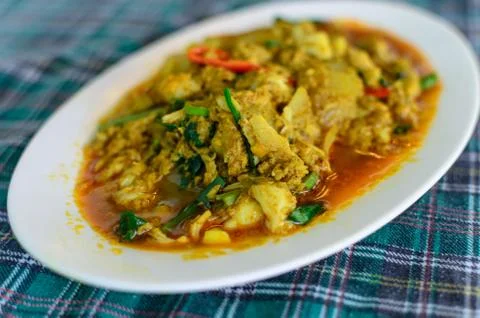 Fried crab with curry Stock Photos