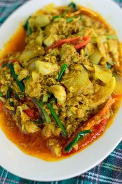 Fried crab with curry Stock Photos