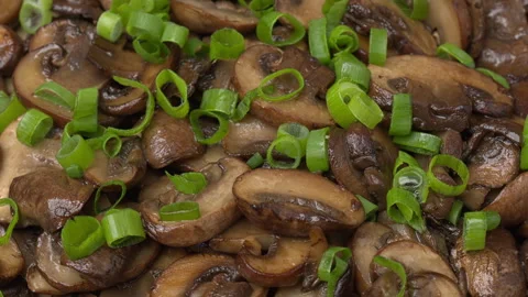 Fried cremini mushrooms background. Stock Footage 311950975