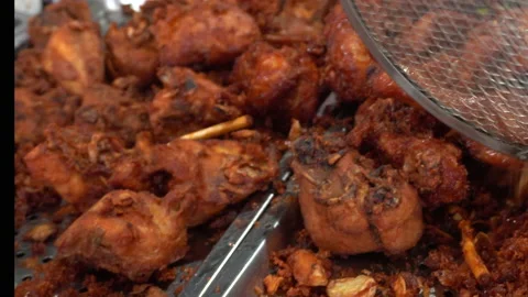 Fried crispy chicken with garlic and herb Thai southern local phuket style oi Stock-Footage 162168196