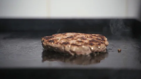 Fried cutlet on the stove Stock Footage 129685202