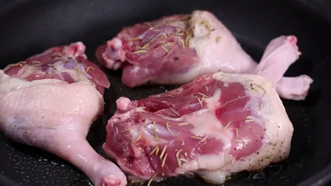 Fried duck legs on a pan. Video stock 146138466