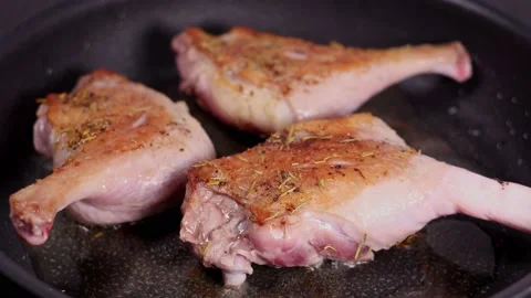 Fried duck legs on a pan. Stock Footage 146138580