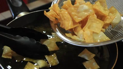 Fried dumplings that have been cooked Stock Footage 334647350