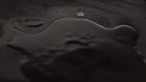 Fried egg being cooked on a hot cooking plate Stock-Footage 128825547