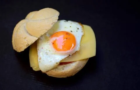 Fried egg with bread Stock Photos