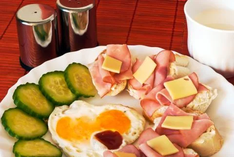 Fried egg with canapés Stock Photos