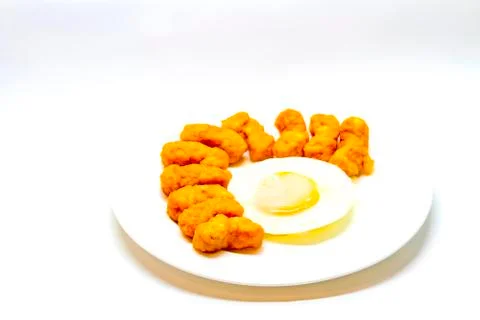 Fried egg with chicken snack Stock Photos