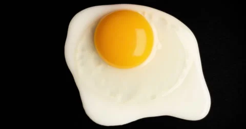Fried Egg Close-Up Time Lapse. Stock Footage 282802028
