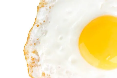 Fried egg closeup Stock Photos