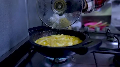 Fried egg, cook, cooking, food, frying pan. Slow motion. Close up. Stock Footage 170905565