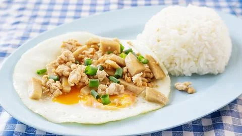 Fried egg with cooked rice. Stock Photos