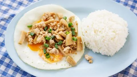 Fried egg with cooked rice. Stock Photos