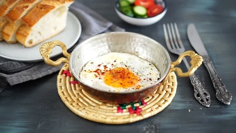 Fried egg in the copper frying pan Stock Footage 90709138