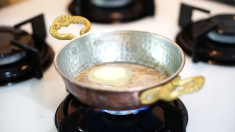 Fried egg in the copper frying pan Stock Footage 90710414
