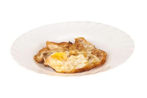 Fried egg dish burn isolated on white background Stock Photos