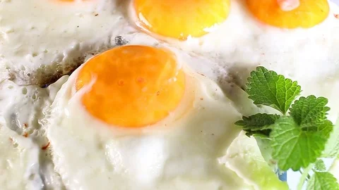 Fried egg eggs closeup Stock Footage 96368672