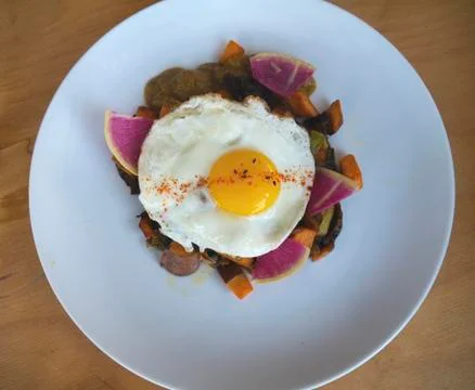 Fried egg on figs  Stock Photos