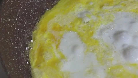 Fried egg in a frying pan Stock Footage 150406480