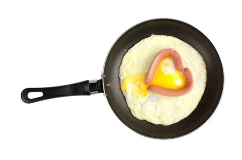 Fried egg in a frying pan Stock Photos