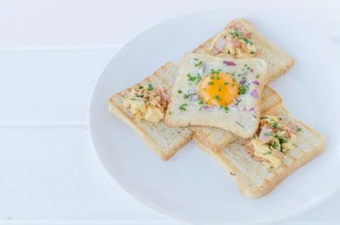 Fried egg inside toast, scrambled eggs Stock Photos
