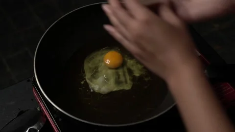 Fried egg medium shot Stock Footage 149174982