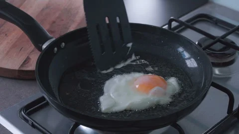 Fried Egg in pan Stock Footage 337318933