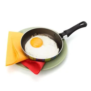 Fried egg on pan Stock Photos