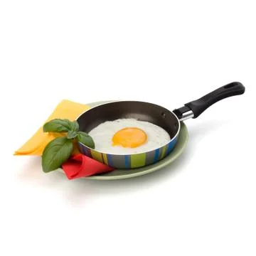 Fried egg on pan Stock Photos