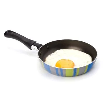 Fried egg on pan Stock Photos