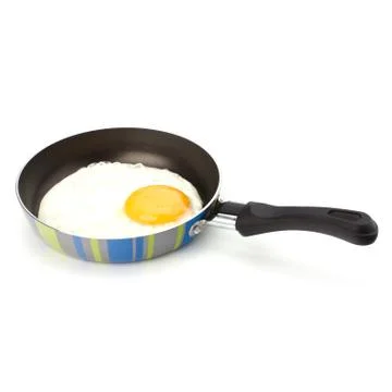 Fried egg on pan Stock Photos